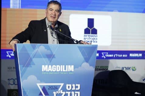 ראול סרוגו בכנס הנדל"ן השנתי של אתר מגדילים // צילום: דרור סיתהכל